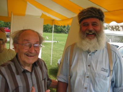 Two men smiling at community day