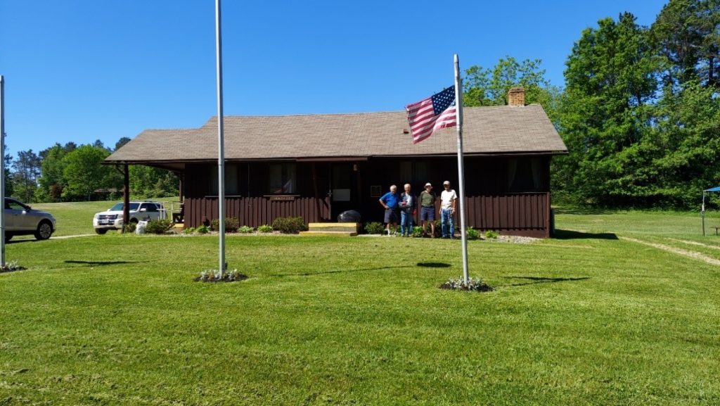 Kiwanis sponsoring the maintenance of the Health Lodge annually at BSA Camp Manatoc. 